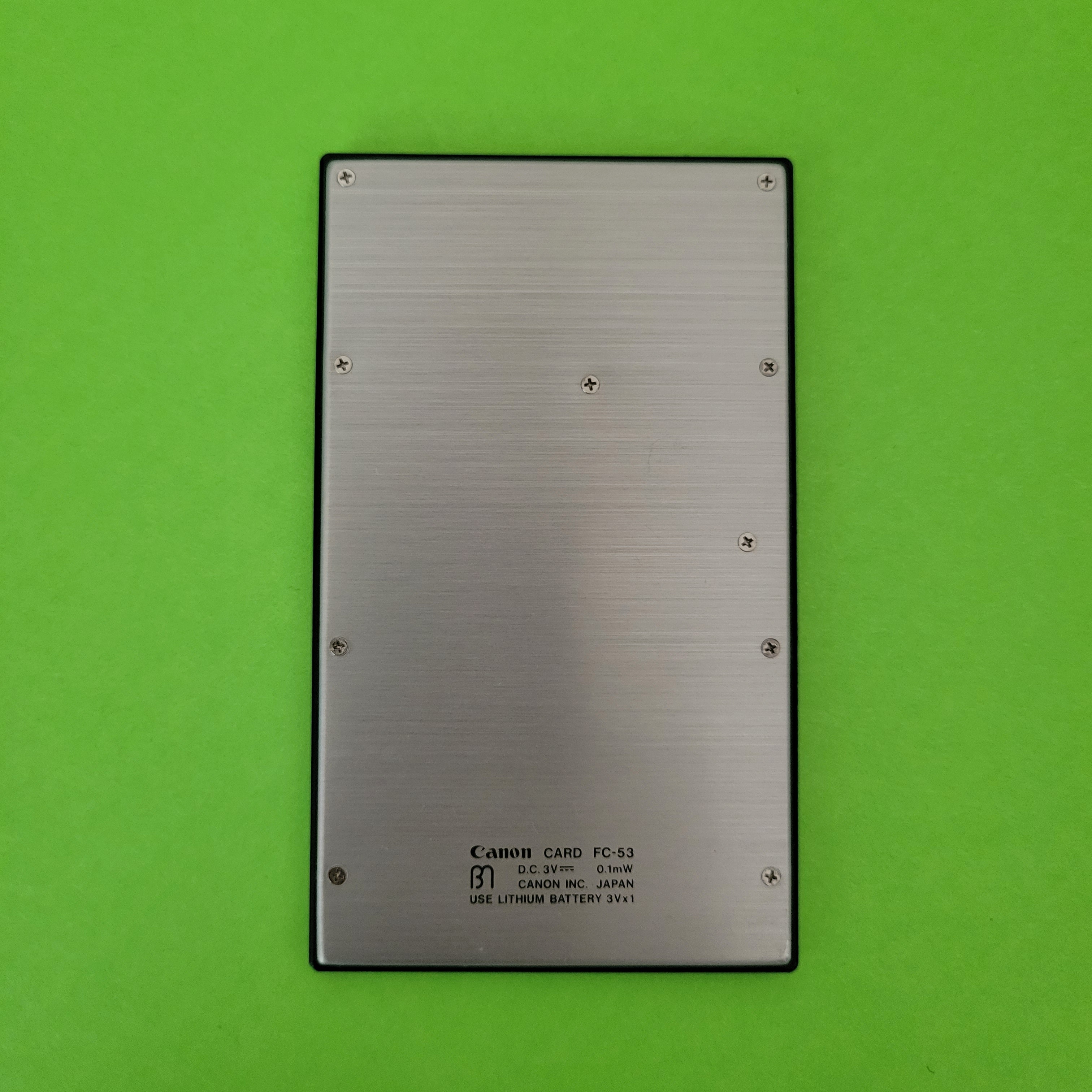 An image of the back of a Canon Card FC-53 Metric Converter
